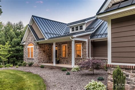 black metal roof whit brick house|brick houses with black roofs.